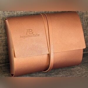 Classy Augustinus Bader Wrap Around Trousseau Bag Dark Tan Colour Began leather